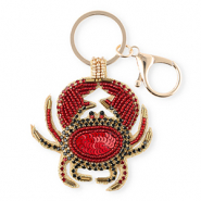 Porte-cl&eacute;s crabe Dor&eacute;-rouge-noir
