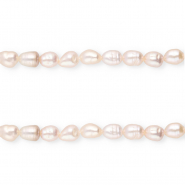 Perles d&rsquo;eau douce imparfaites grain de riz" Rose coquillage