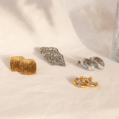 Soyez cr&eacute;atif avec des boucles d'oreilles et bracelets en acier inoxydable