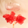 Cr&eacute;ez un look unique avec des boucles d'oreilles avec des fleurs